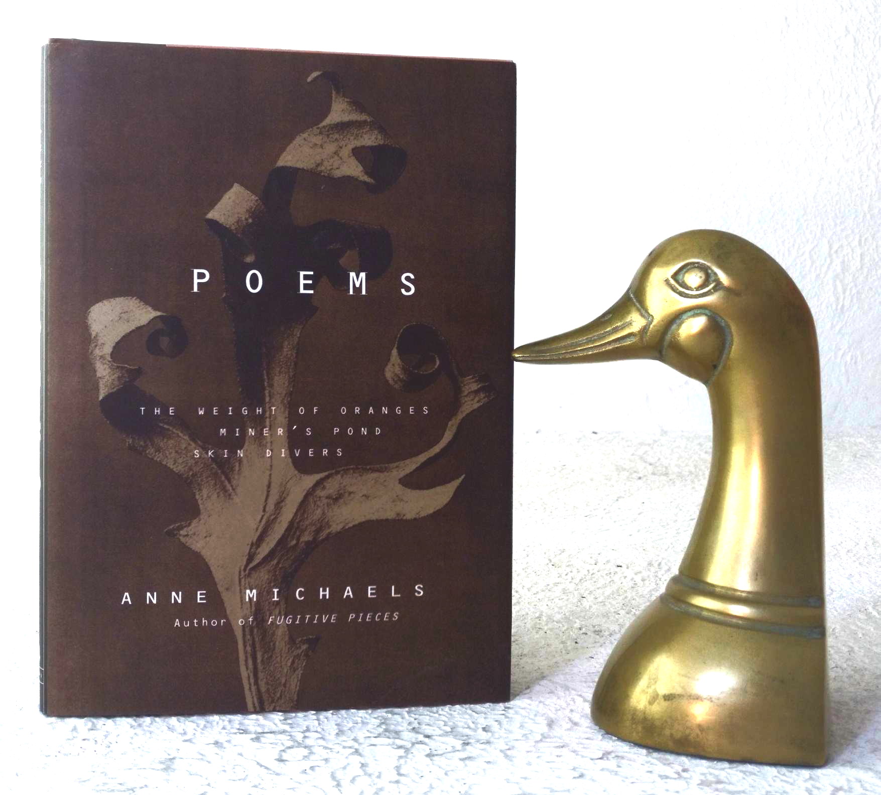 Poems: The Weight of Oranges; Minder's Pond; Skin Divers