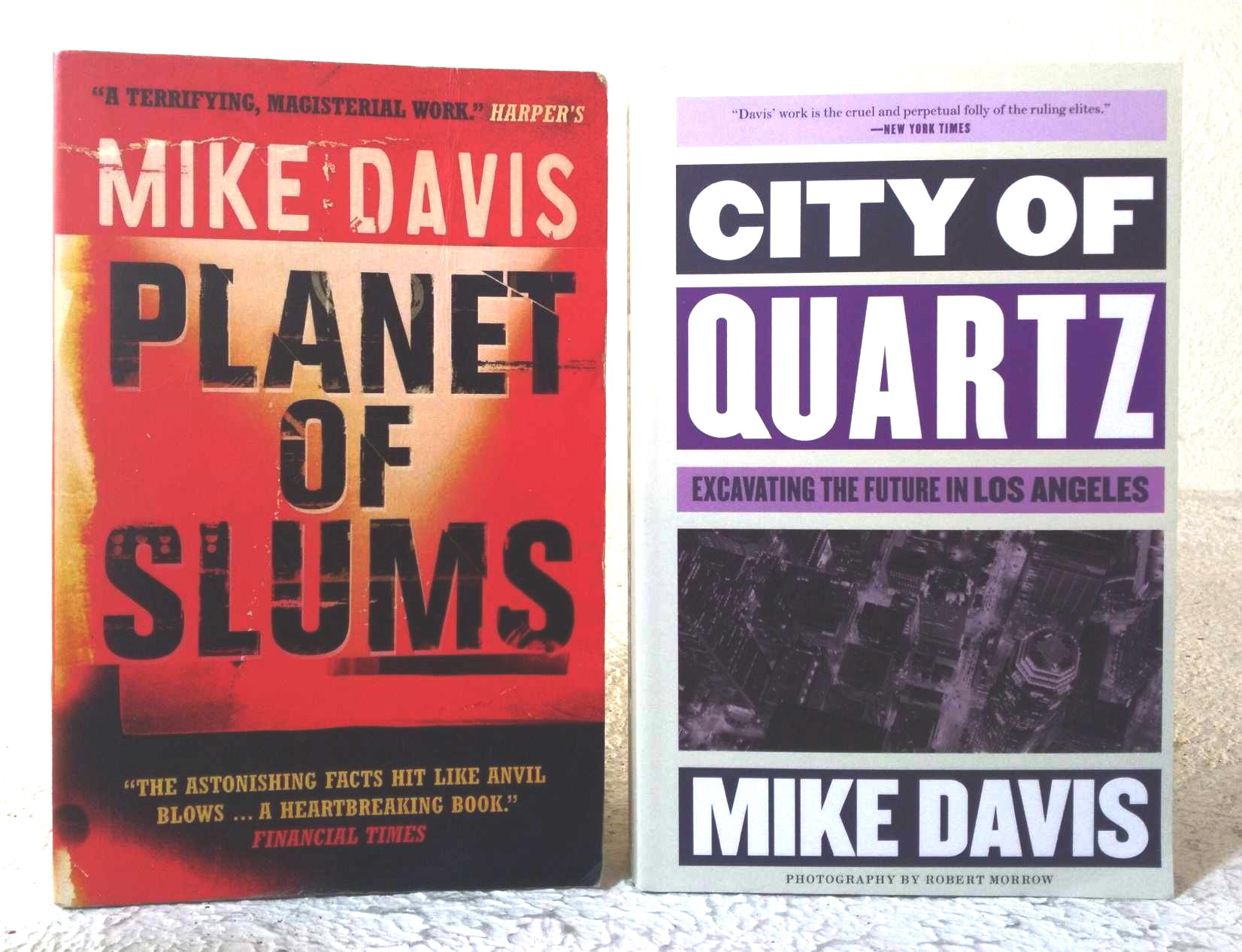 A lot of two (2) Mike Davis titles: Planet of Slums; City of Quartz: excavating the future