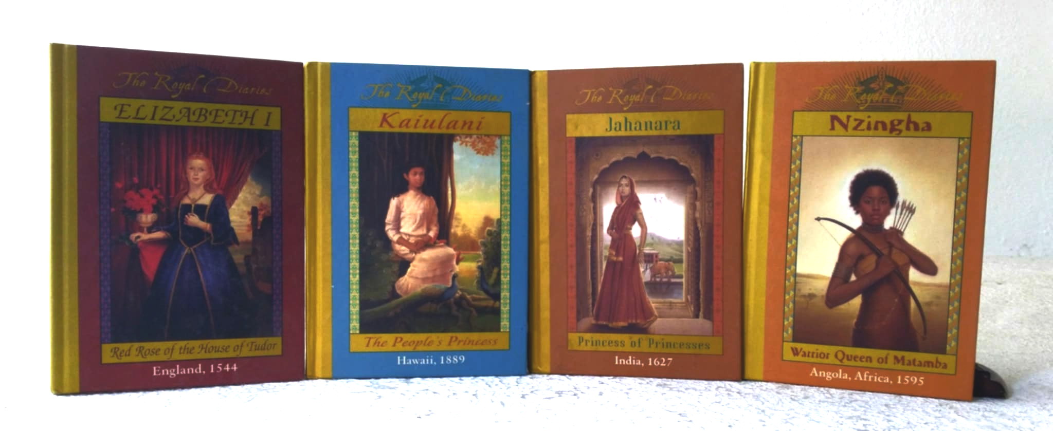 A lot of four (4) The Royal Diaries books: Kaiulani: the People's Princess, Hawaii, 1889; Lady of Ch'iao Kuo: Warrior of the South, Southern China, A.D. 531; Jahanara: Princess of Princesses, India, 1627; Nzingha: Warrior Queen of Matamba, Angola, Africa, 1595; Elizabeth I: Red Rose of the House of 