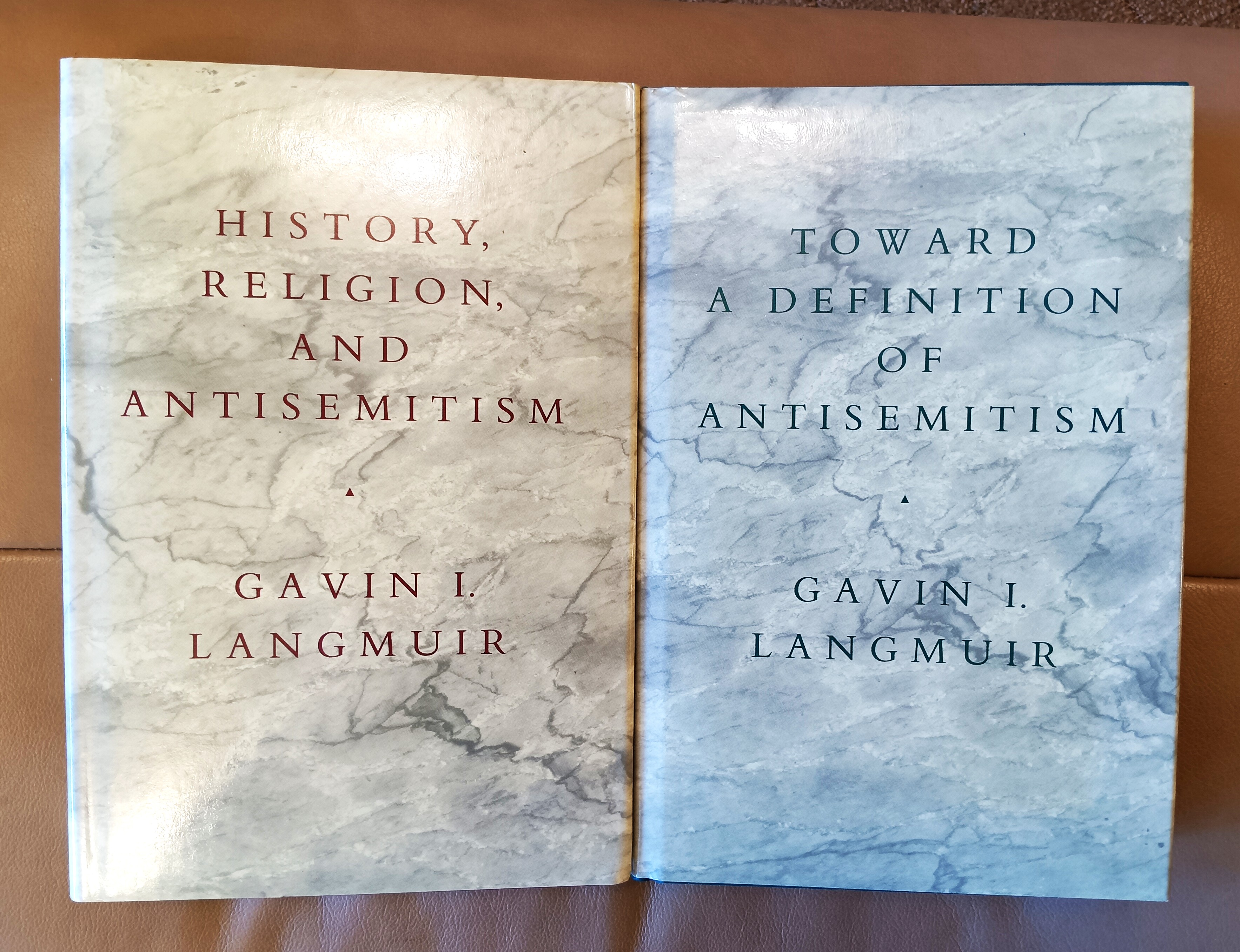 A lot of two (2) books by Gavin I. Langmuir: Toward a Definition of Antisemitism; History, Religion and Antisemitism