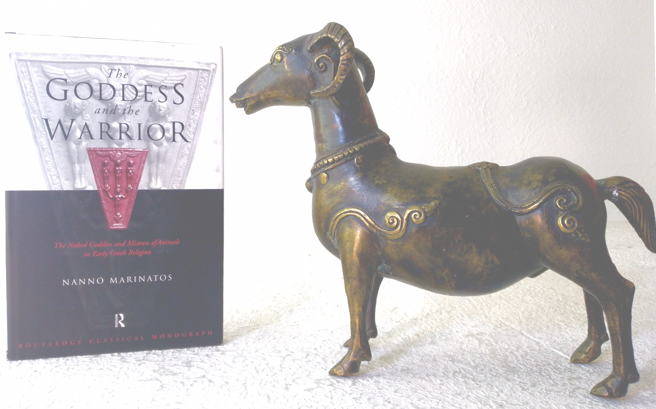 The Goddess and the Warrior: the naked goddess and mistress of animals in early Greek religion